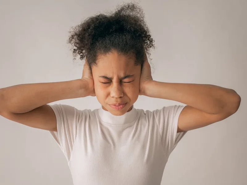 Pharmacist assessing earache